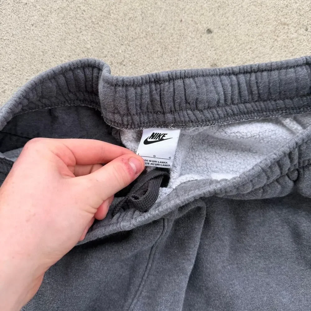 Nike Charcoal Gray Joggers with White Swoosh